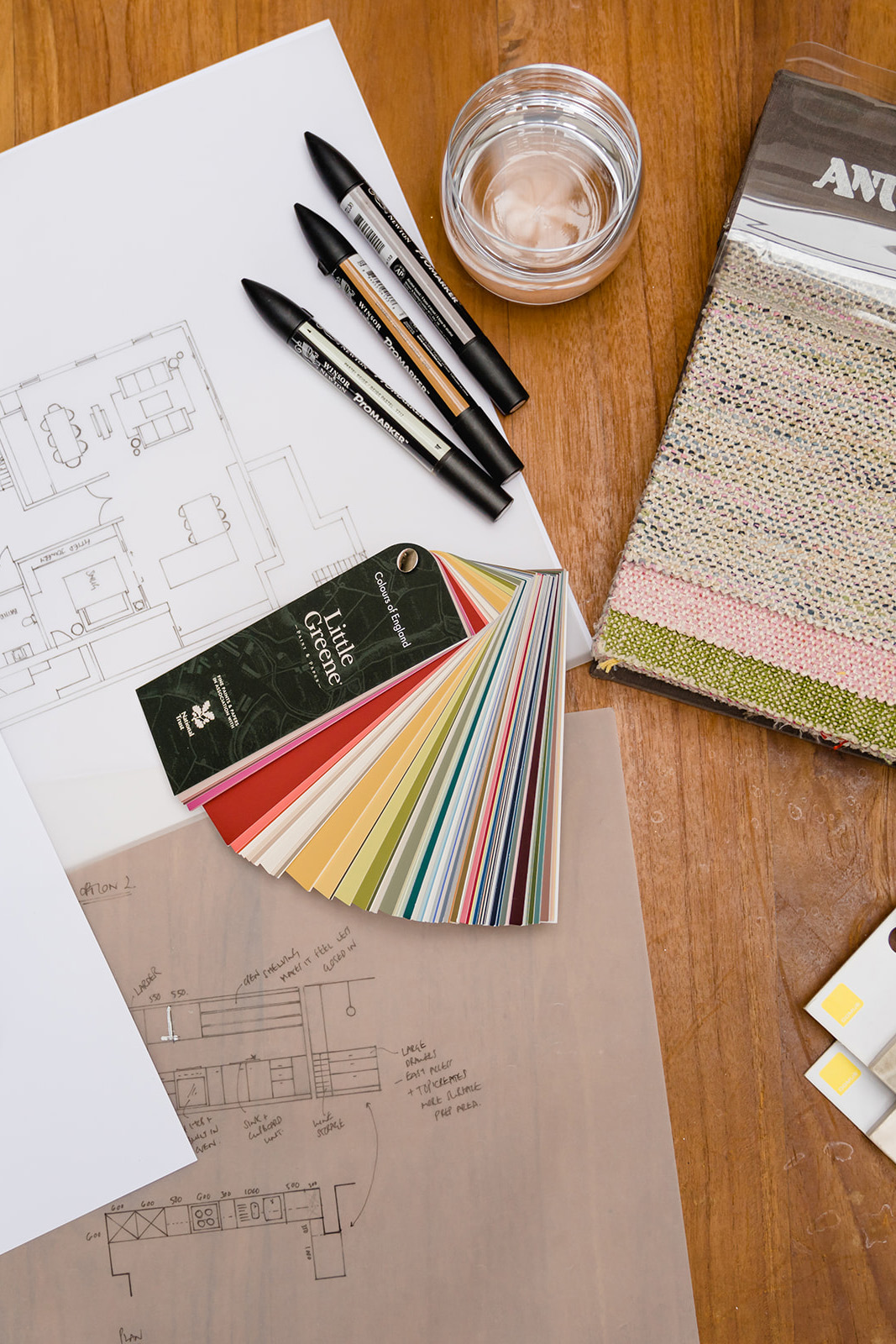 Interior design concept development with floor plans, fabric samples, paint colour cards and material finishes